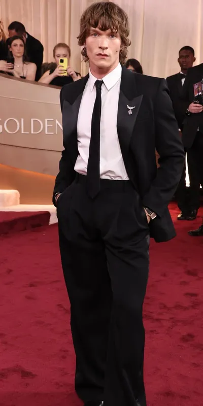 <p>Connor Storrie wore a Jean Schlumberger for Tiffany &amp; Co. Bird on a Rock brooch</p>
