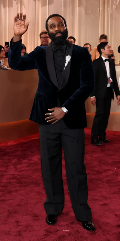 <p>Tramell Tillman in the Plume de Paon XL brooch by Boucheron</p>
