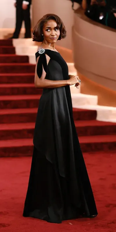 <p>Ayo Edebiri’s black velvet Chanel gown had a jewelled element woven into the design</p>
