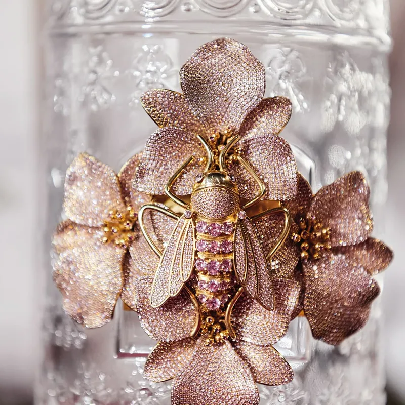 <p>A closer look at the jewelled element of the Bee Bottle, which also features a bee motif in the glass itself</p>