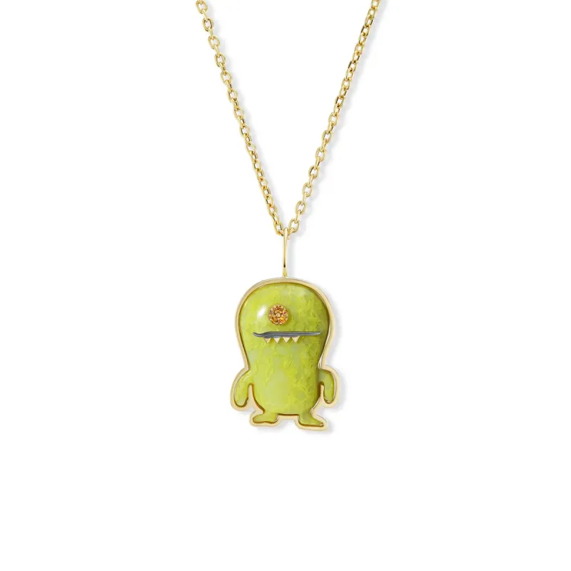Brent Neale Monster Charm in 18K yellow gold, with a carved Brazilian opal and orange sapphires