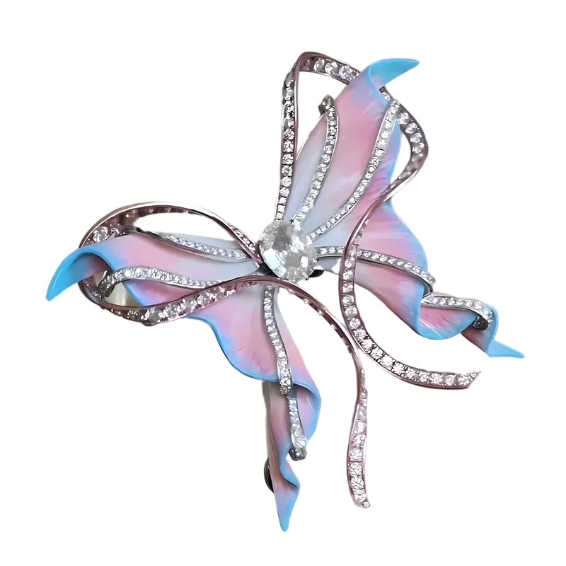 <p>Anna Hu’s Yunxia Diewu Butterfly Brooch in titanium and ceremic, set with a 2.28-carat oval rose-cut diamond</p>
