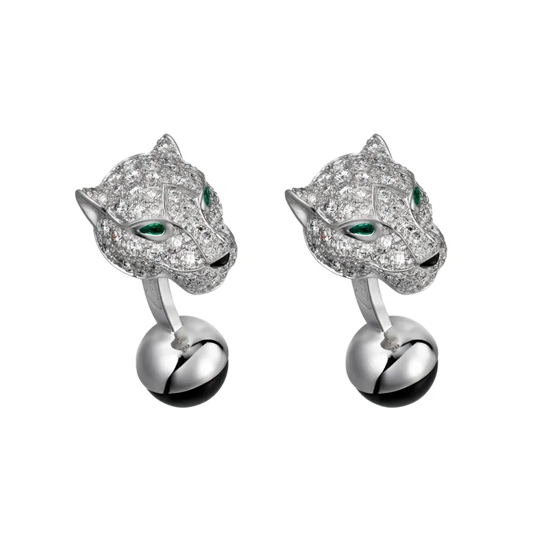 <p>‘Panthère de Cartier’ diamond, emerald and white gold cufflinks</p>