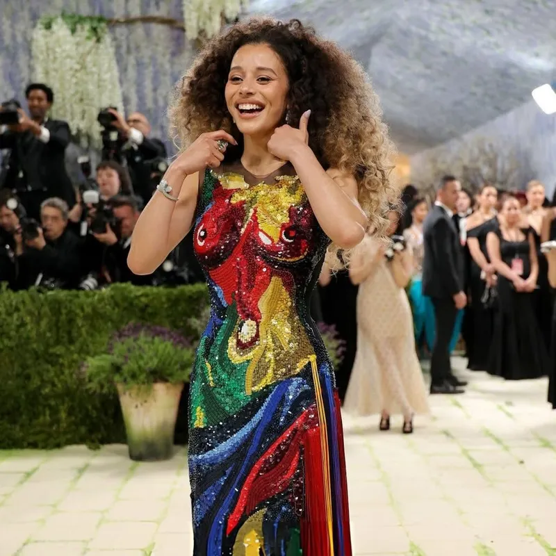 <p>Chase Infiniti’s MARLI New York jewels echoed the palette of colours on her Thom Browne gown, which mapped the body in a rainbow of sequins</p>
