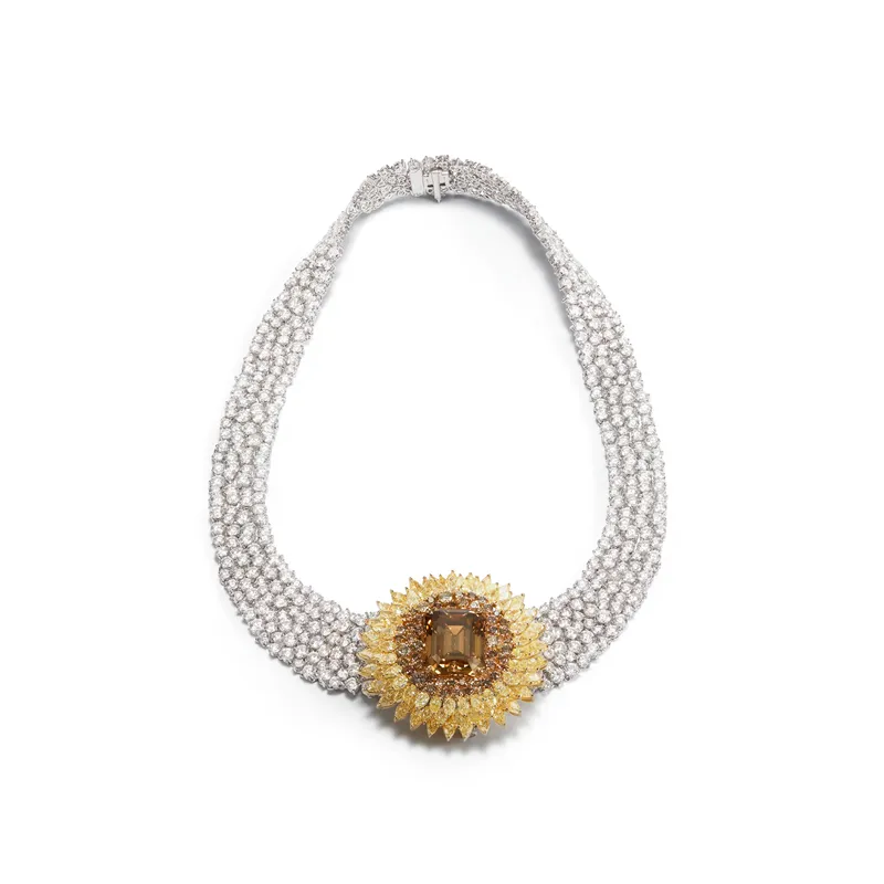 Damiani Radiosa necklace featuring a detachable sunflower pendant/brooch, set with a magnificent Fancy Yellow-Brown diamond of over 21 carats