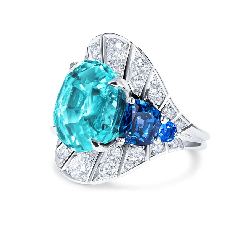 David Morris Indico ring, set with a 16.43ct oval Mozambique Paraíba tourmaline with cobalt spinels and diamonds in 18ct white gold