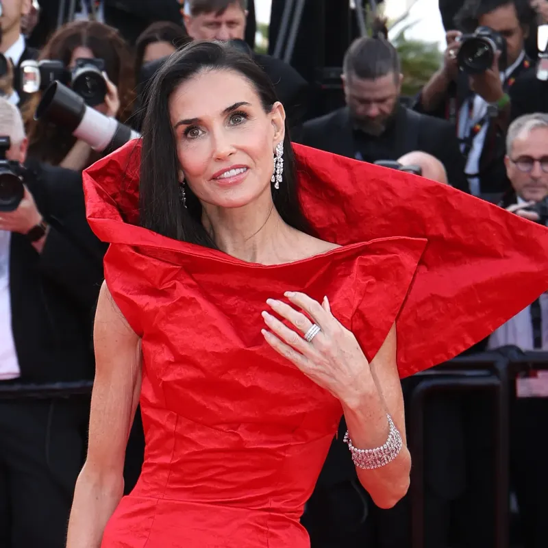 <p>Demi Moore at the 2026 Cannes Film Festival in a pair of diamond chandelier-style earrings and a bracelet by Chopard</p>