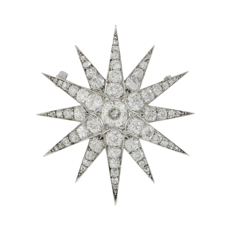 <p>The Victorian diamond star brooch, provided by Bentley & Skinner, worn by Laura Carmichael as Lady Edith</p>