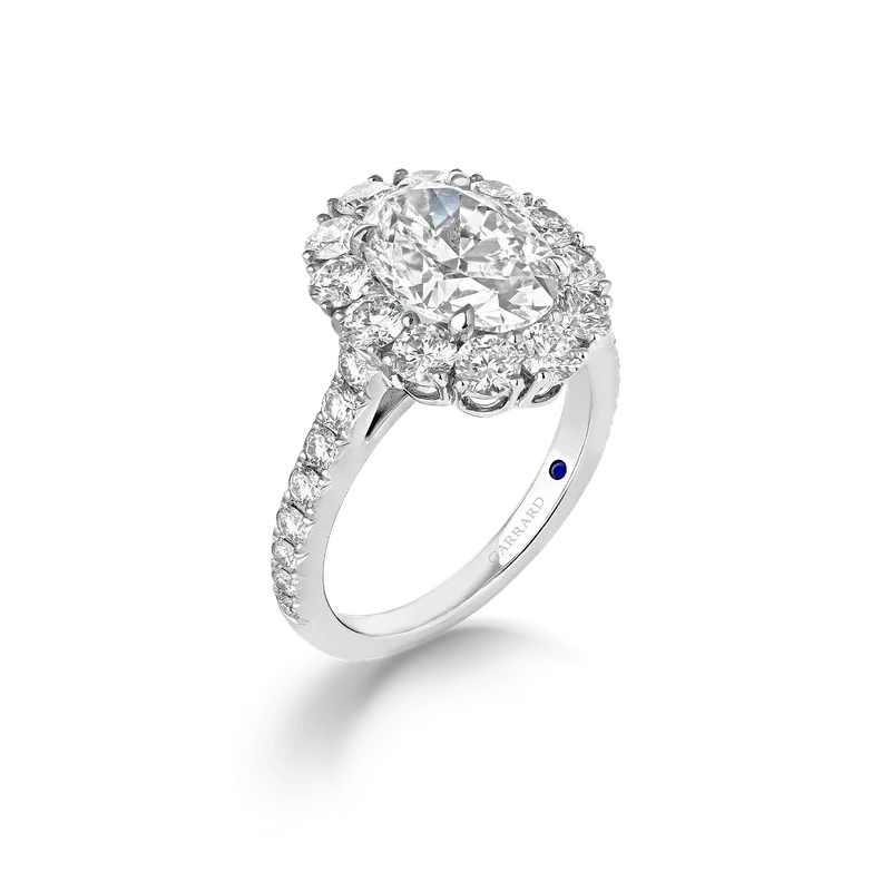 <p>Garrard 1735 oval diamond engagement ring in platinum.</p>