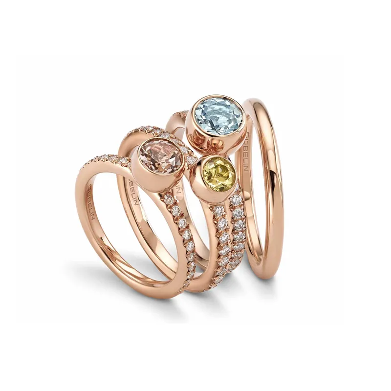 <p>‘Sparks of Fire’ rings with morganite, yellow beryl, aquamarine and diamonds</p>