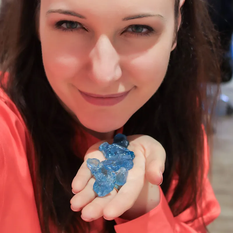 <p>Katerina Perez presents a selection of rough gem material mined in Madagascar during a visit to the Morebelli boutique in Antananarivo</p>