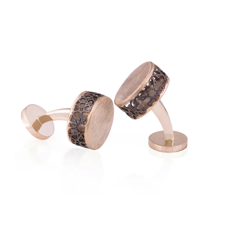 <p>‘Identity West and East’ cufflinks</p>