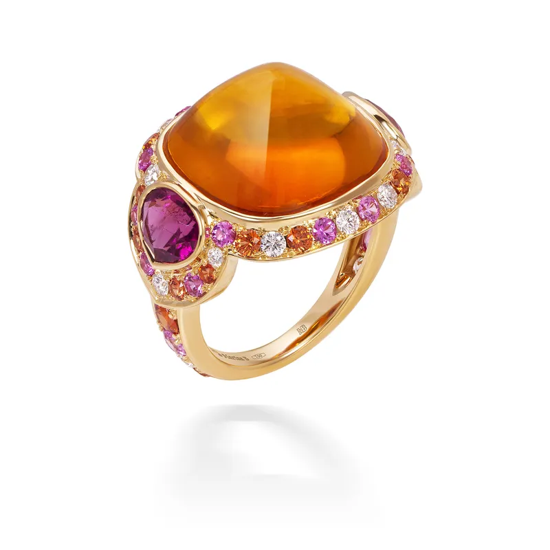 <p>Marina B Pacila high jewellery ring, set with a 16.20ct citrine sugarloaf cabochon, pear-shaped rubellites and pavé-set pink and orange sapphires and diamonds in 18k yellow gold</p>
