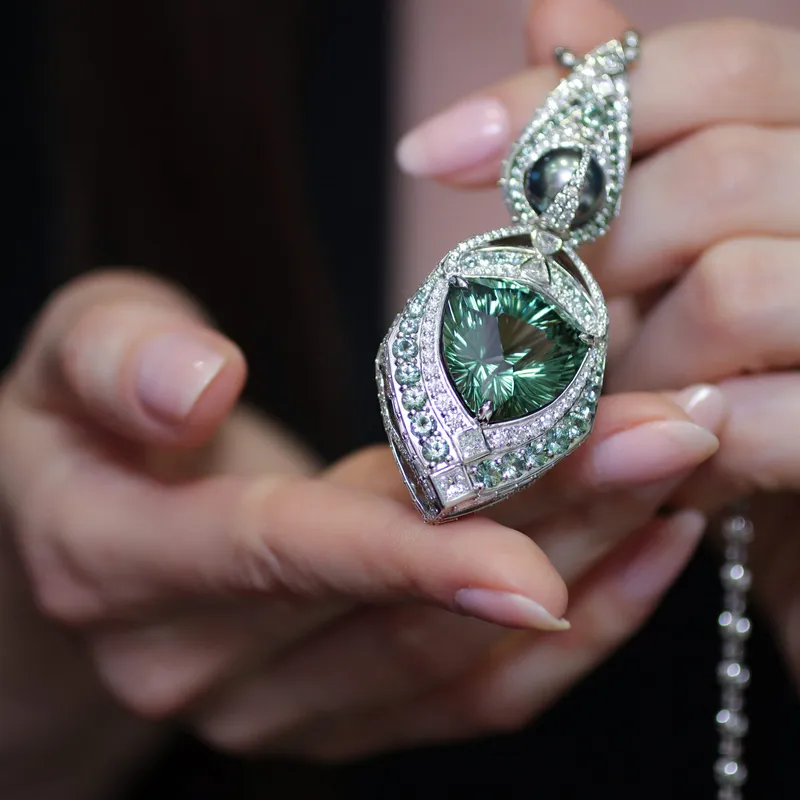 <p>The striking one-of-a-kind Exuma pendant with a fantasy-cut cuprian tourmaline of more than 30 carats, diamonds and a black pearl set in white gold</p>