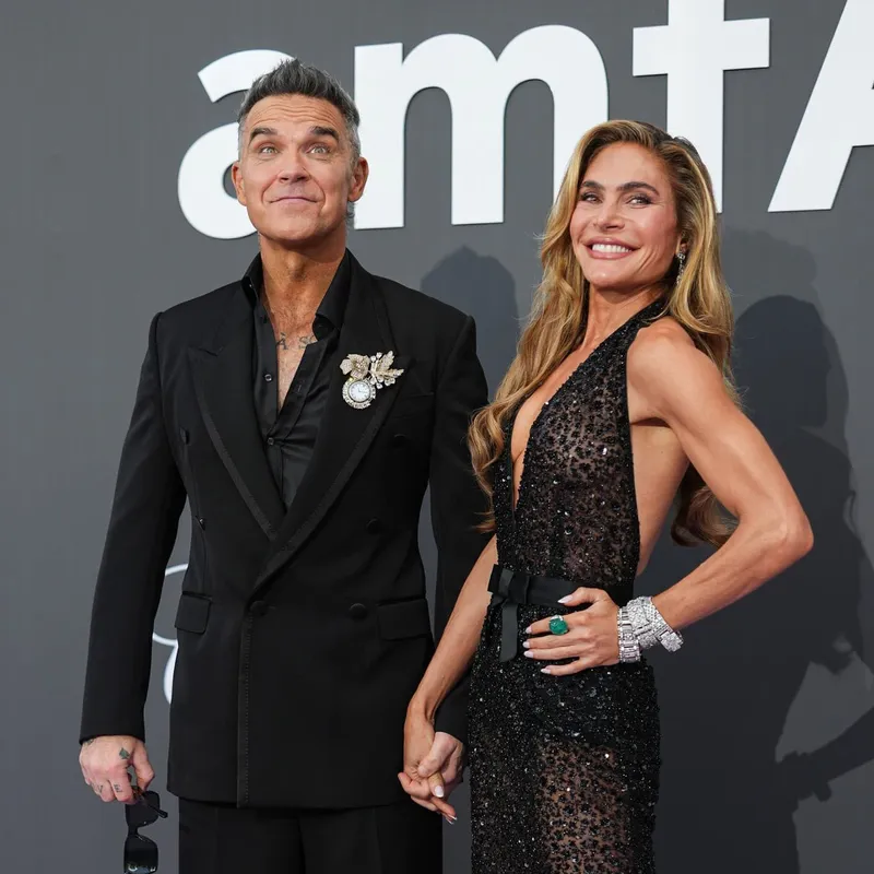<p>Singer Robbie Williams in a lapel brooch by Dolce & Gabbana at the 2026 Cannes Film Festival</p>