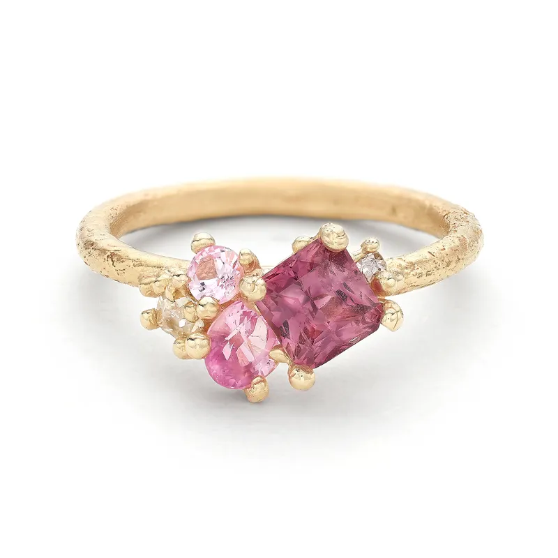 <p>Pink sapphire and champagne diamond cluster ring</p>
