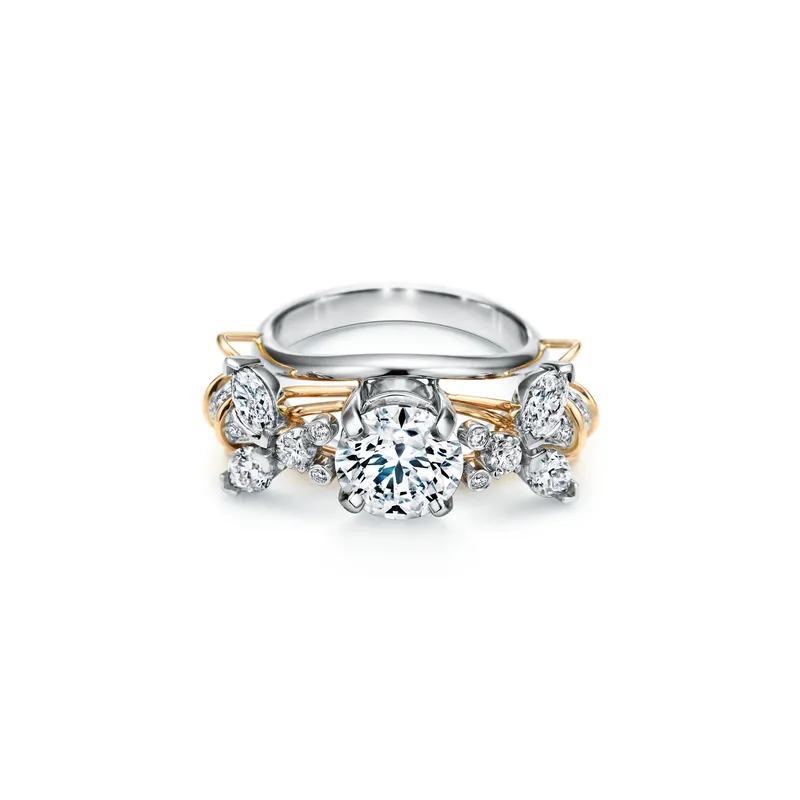 <p>Tiffany & Co. Schlumberger Two Bees diamond engagement ring in platinum and 18K yellow gold.</p>