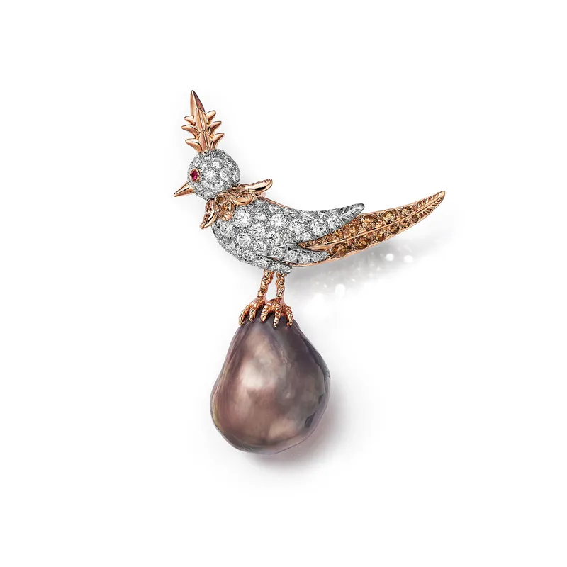 <p>Tiffany &amp; Co. Bird on a Pearl high jewellery brooch set with an orange brown semi-baroque natural saltwater pearl of 20.15 carats</p>
