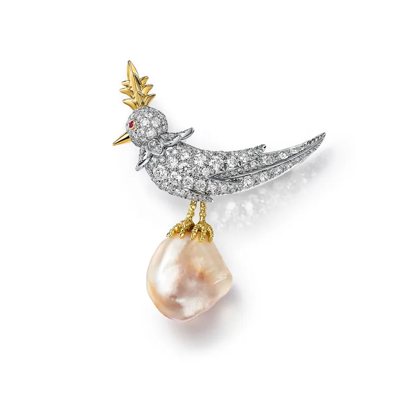<p>Tiffany &amp; Co. Bird on a Pearl high jewellery brooch set with a white and light orangy brown baroque natural saltwater pearl of 20.04 carats</p>
