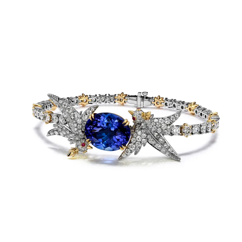 <p>Tiffany & Co. Bird on a Rock High Jewellery bracelet in platinum and 18k yellow gold with a tanzanite of approximately 8 carats, diamonds and rubies</p>