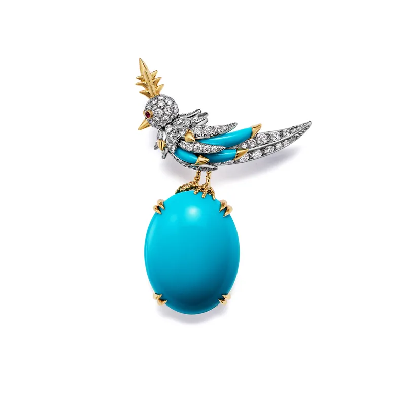 <p>Tiffany & Co. Bird on a Rock High Jewellery brooch in platinum and 18k yellow gold with a turquoise of approximately 24 carats, turquoise accents, diamonds and rubies</p>