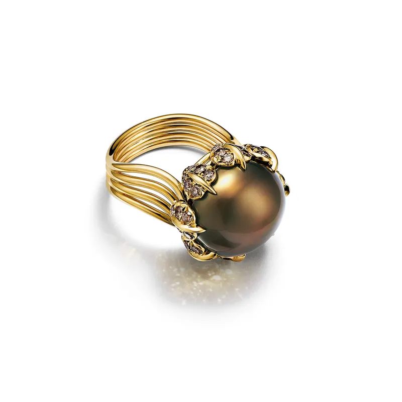<p>Tiffany &amp; Co. Bird on a Pearl high jewellery ring in 18k yellow gold with a yellow brown button natural saltwater pearl of 12.26 carats and Fancy Brown diamonds</p>
