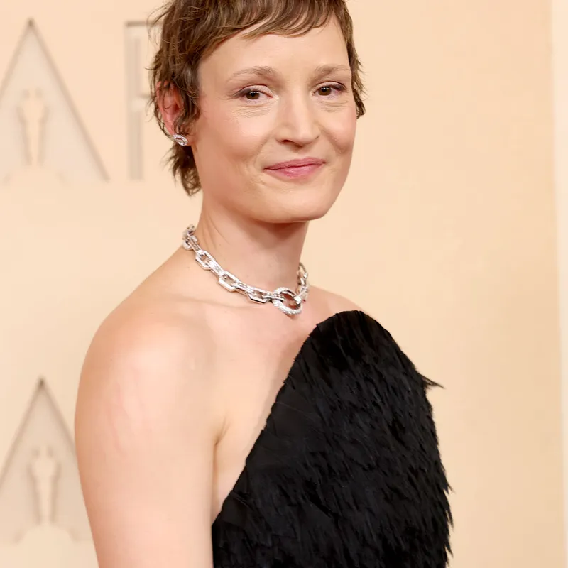 <p>Vicky Krieps wears Messika Groove necklace, Hypnotic Scale earrings, Dancing Moon two-finger ring and Moderniste two-finger ring</p>
