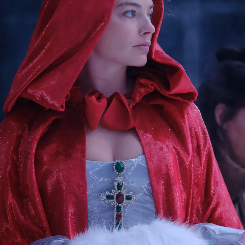 <p>The second cross brooch worn by Robbie is almost certainly period-inspired. Reserved for the elite, emeralds and rubies of that scale would have been prohibitively expensive for the Earnshaw family</p>
