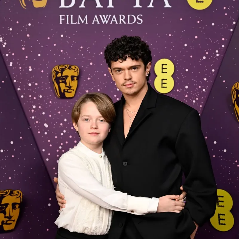 <p>Noah Jupe (right) looked elevated in a Toi et Moi ring, an Inner Fire necklace and an Inner Fire earring, all by Bucherer Fine Jewellery</p>