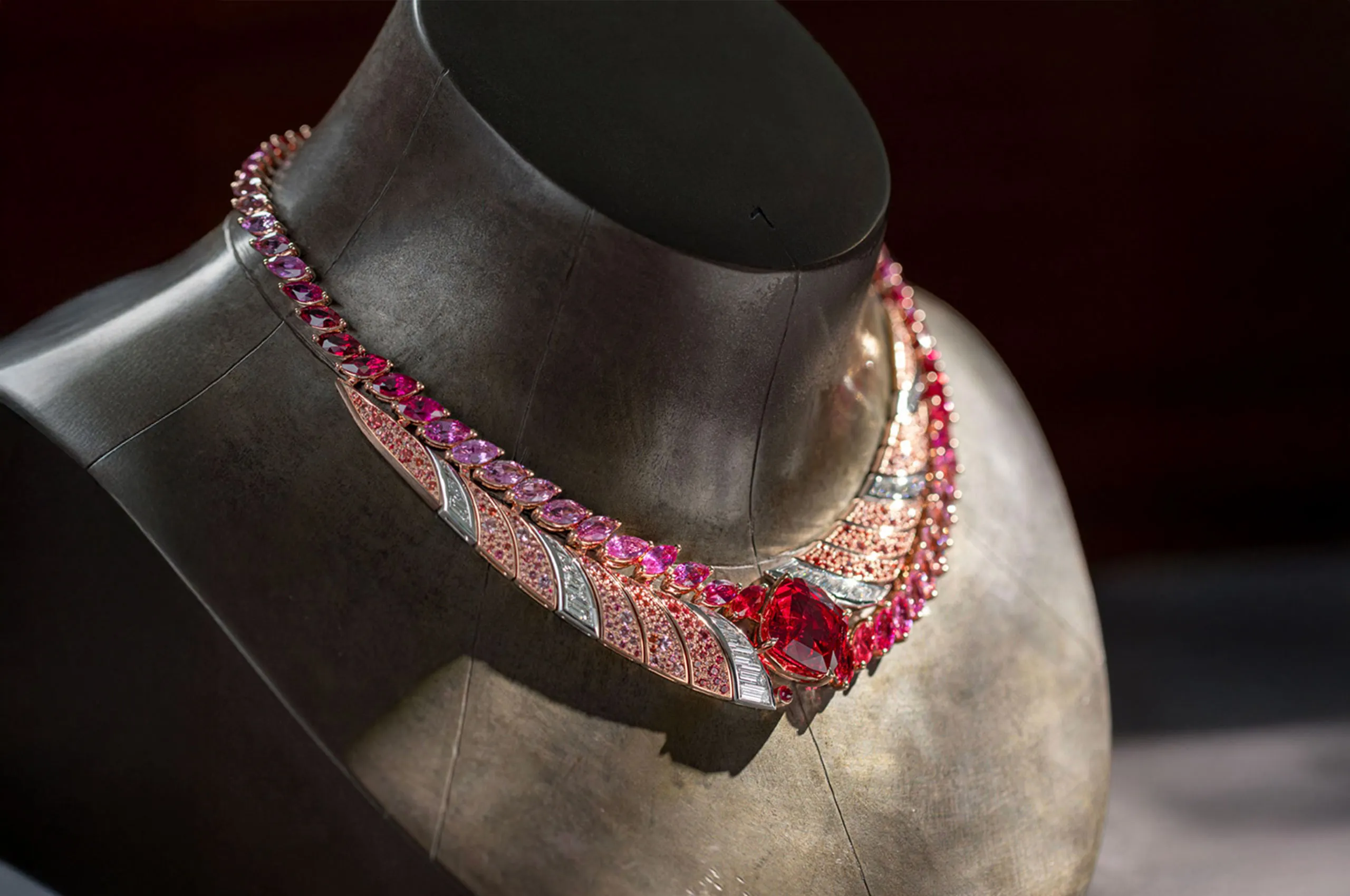 <p>House of Gübelin Tanzanian Sunrise High Jewellery necklace with a 22 carat cushion-shaped red spinel from Tanzania, baguette-cut diamonds, orange and rose-coloured spinel pavé, and marquise-cut spinels, sapphires and rubies set in 18k rose gold and platinum </p>
