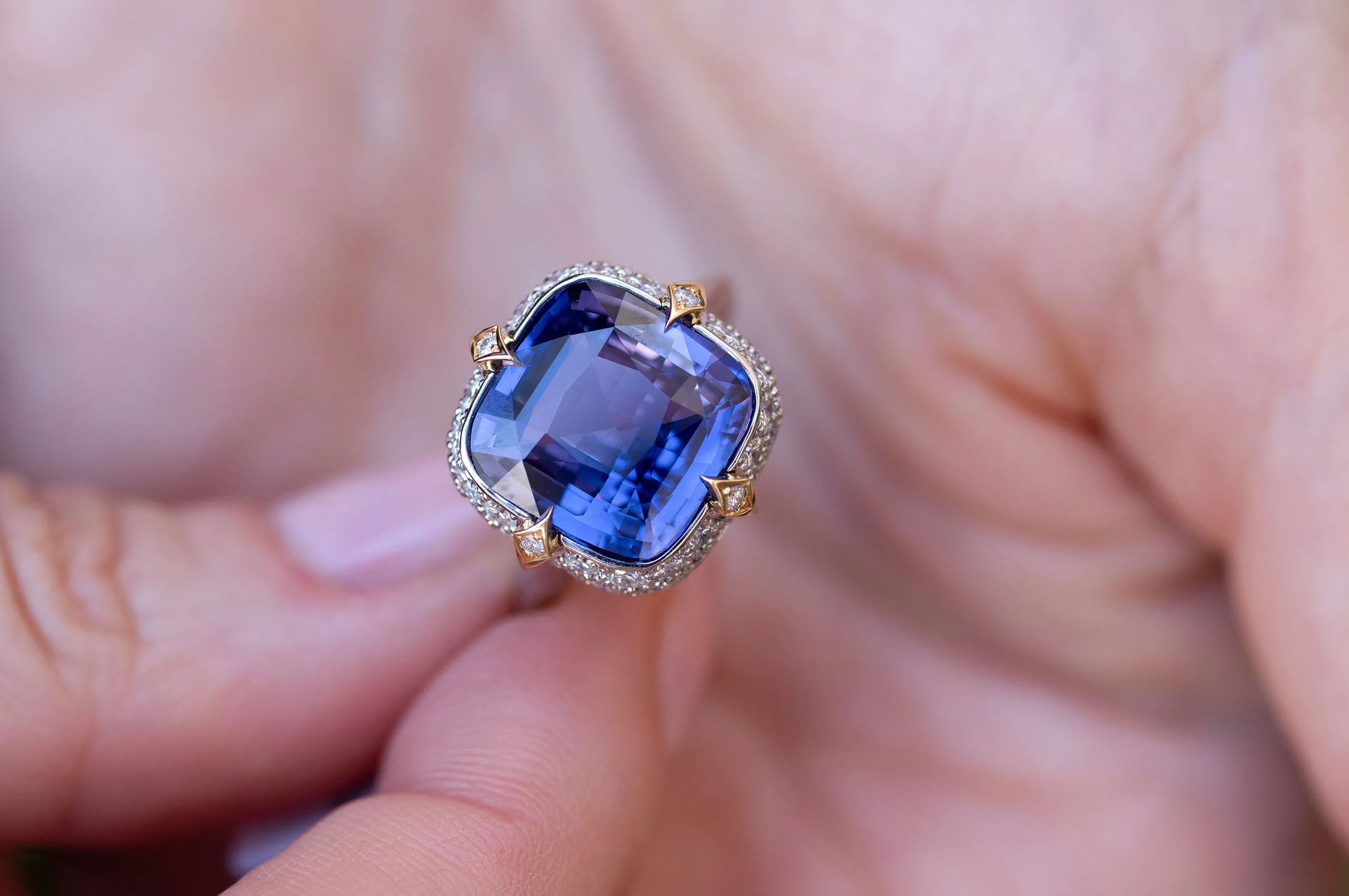 A 7.97-carat natural, unheated purple sapphire of exceptional colour and clarity crowns this Bayco ring