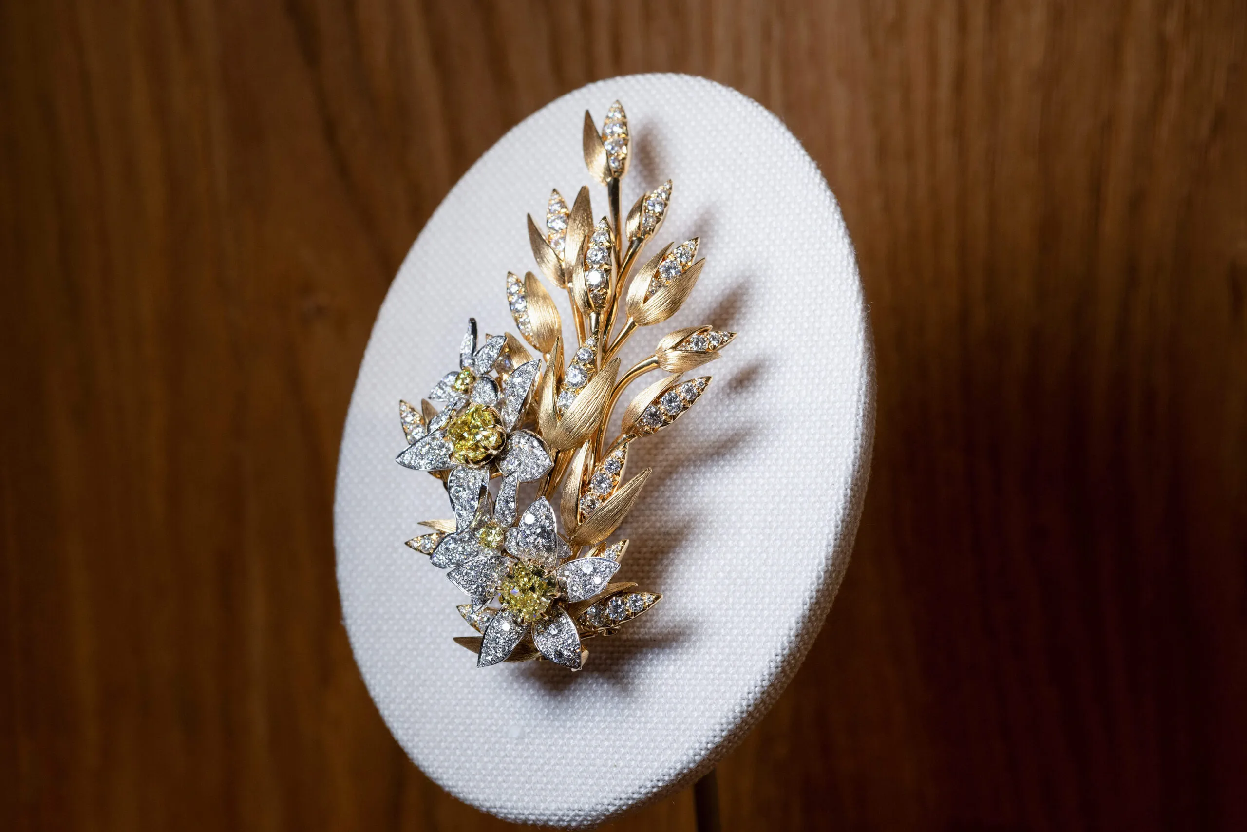 <p>The Oat and Field Star high jewellery brooch with gleaming gold stalks and diamond flowers</p>
