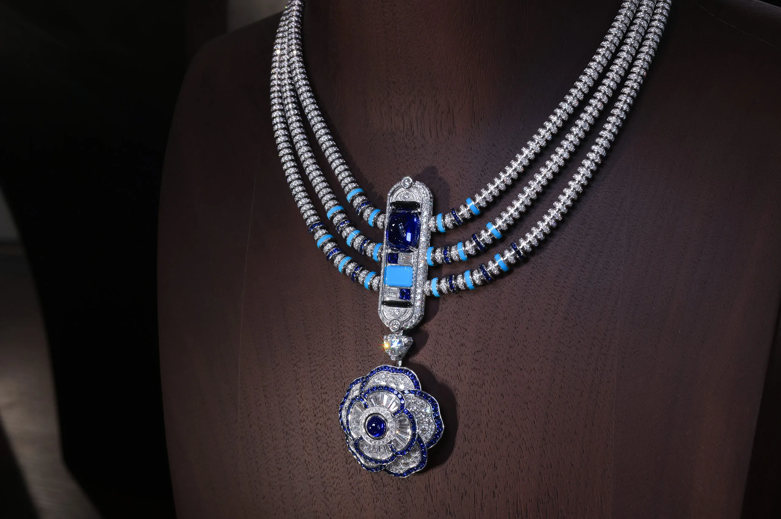 Chanel Symbole Saphir necklace in white gold, set with diamonds, sapphires, turquoise, onyx and black lacquer
