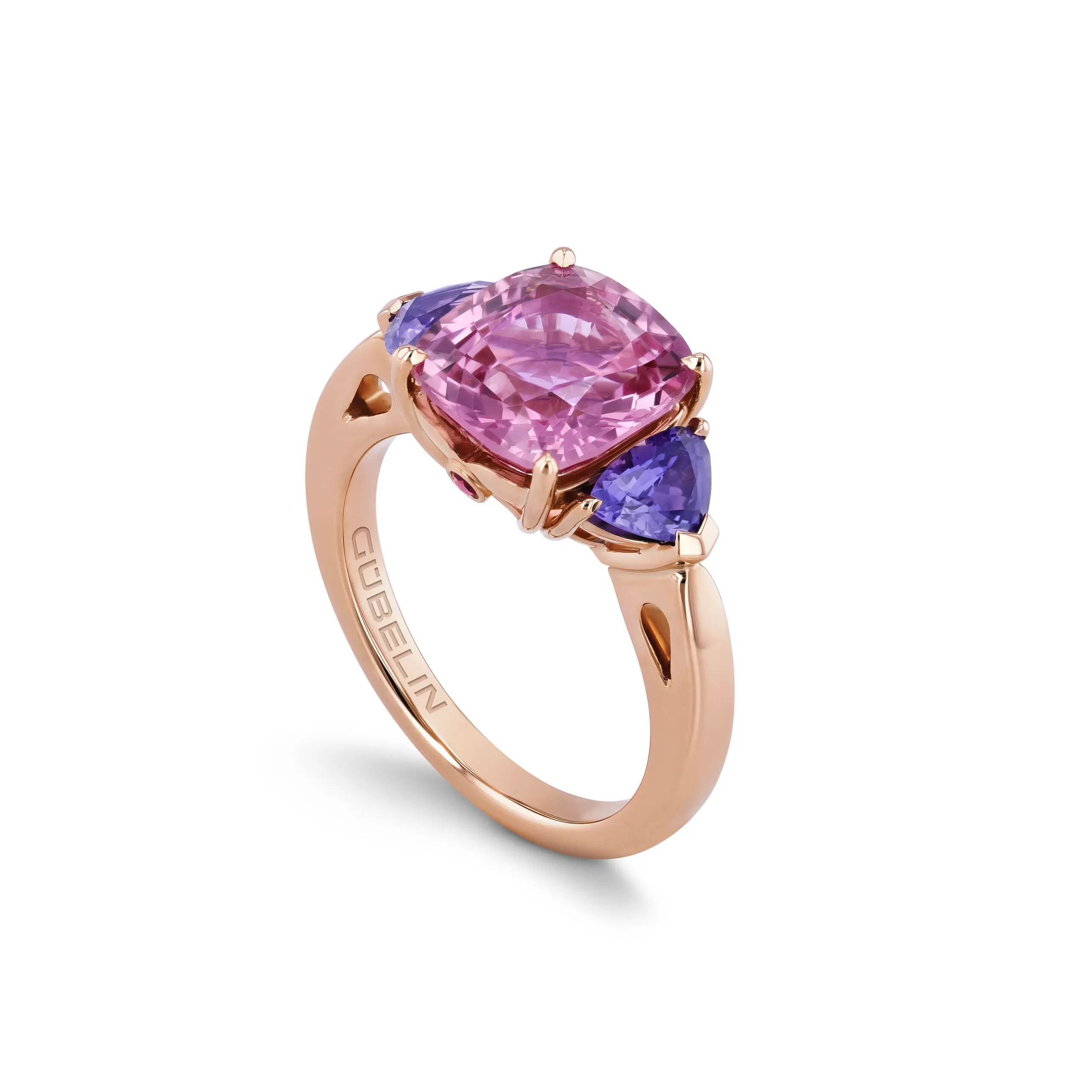 <p>House of Gübelin ring with a 4.29 carat purplish-pink spinel from Burma (Myanmar) set alongside two lavender-coloured sapphire trilliants in red gold </p>
