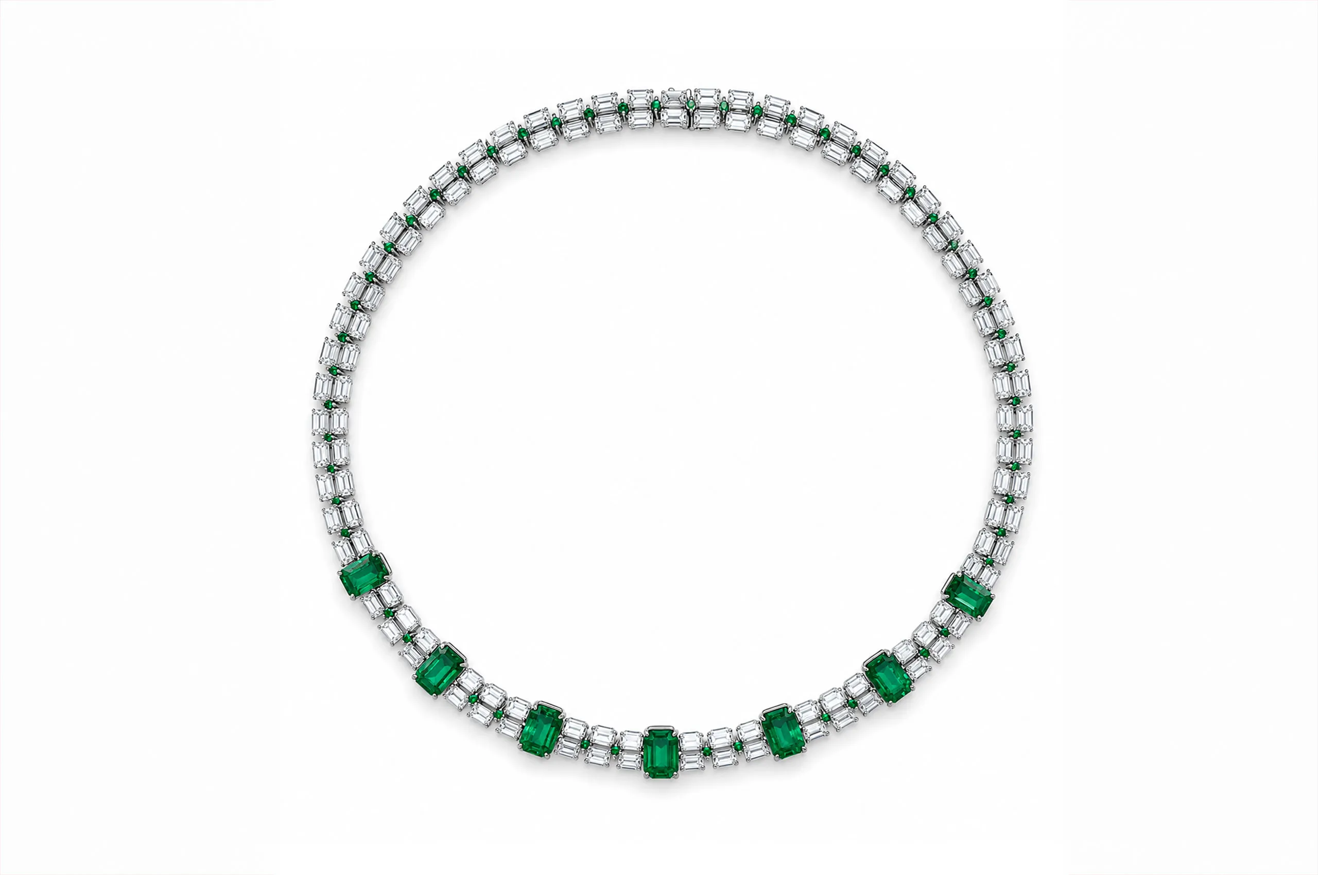 Bayco necklace set with seven perfectly matched emerald-cut Colombian emeralds totalling 14.83 carats, interspersed with emerald-cut diamonds and round brilliant-cut emeralds