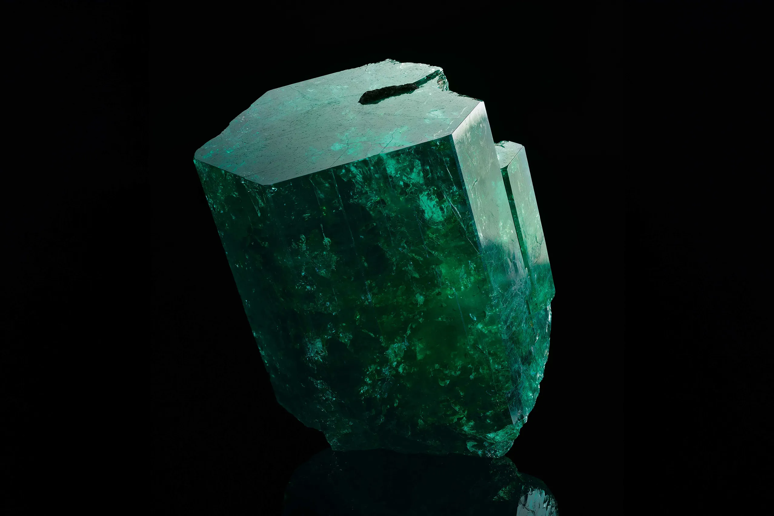 <p>Uncut Muzo emeralds</p>