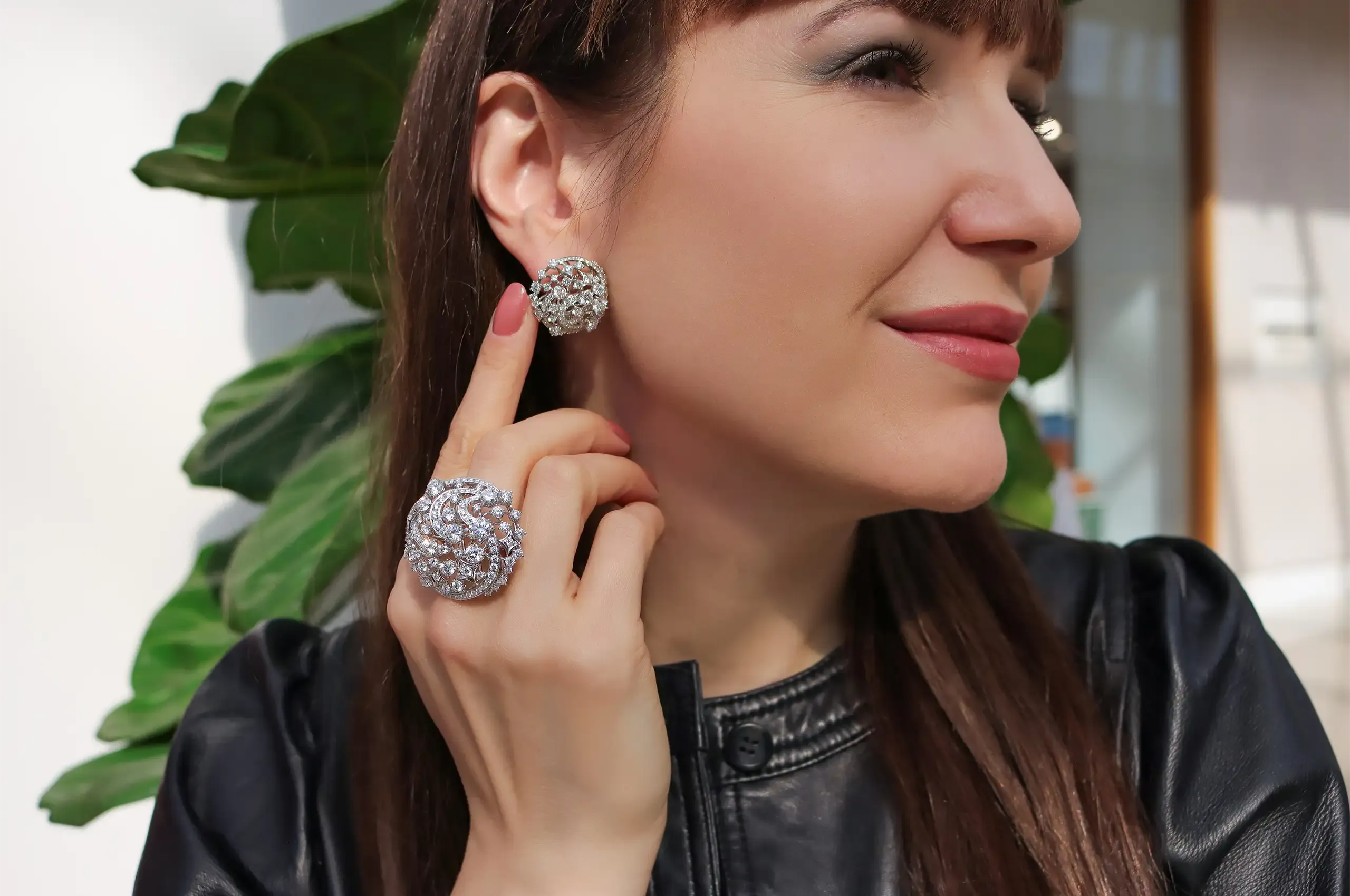 The Galaxy Diamond Earrings feature 158 round brilliant-cut diamonds weighing 5.51 carats, paired here with the 6.92-carat Galaxy Diamond Ring