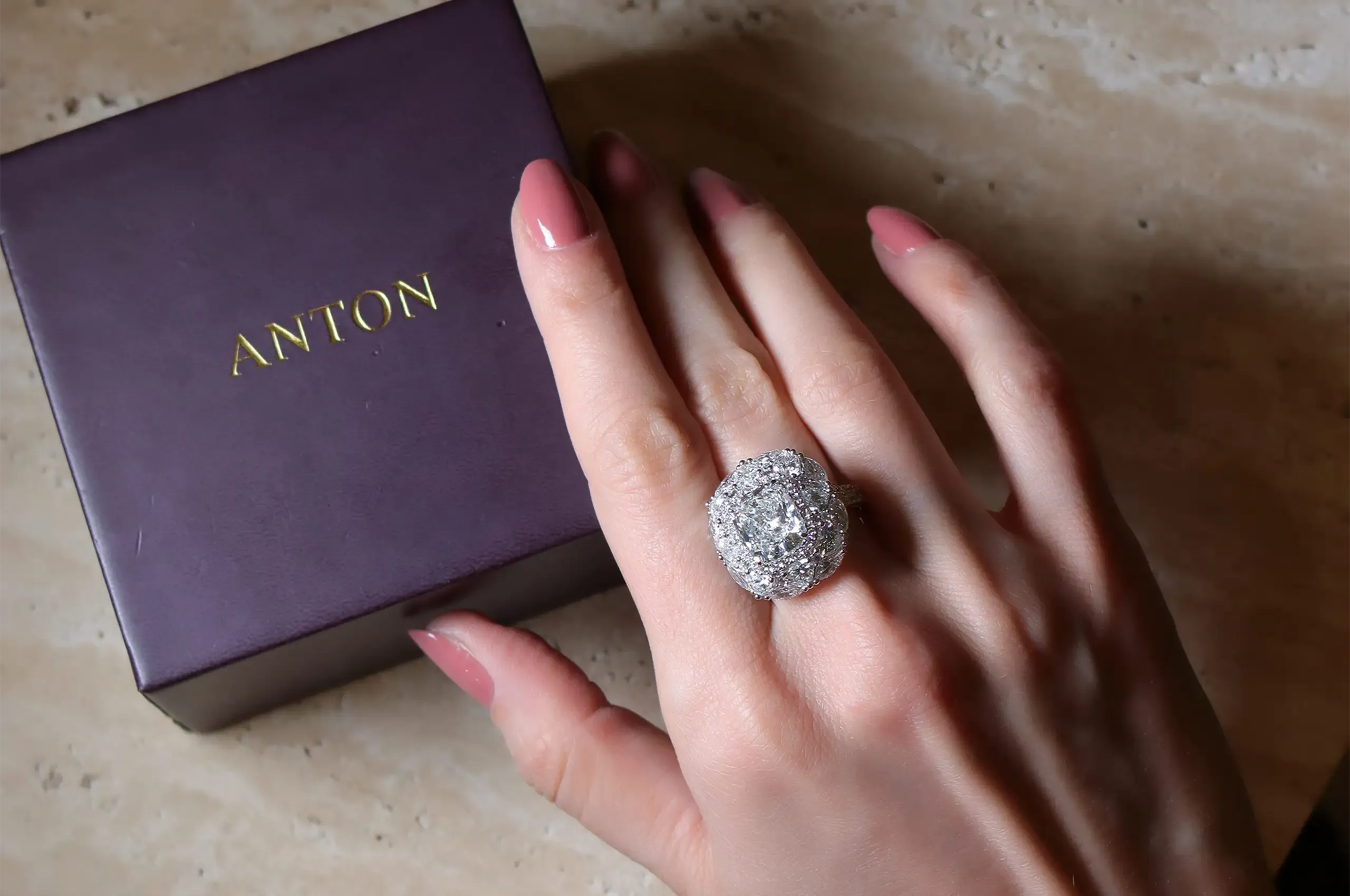 ANTON’s High Jewellery cushion cut diamond ring showcasing a 5.23ct GIA-certified natural diamond