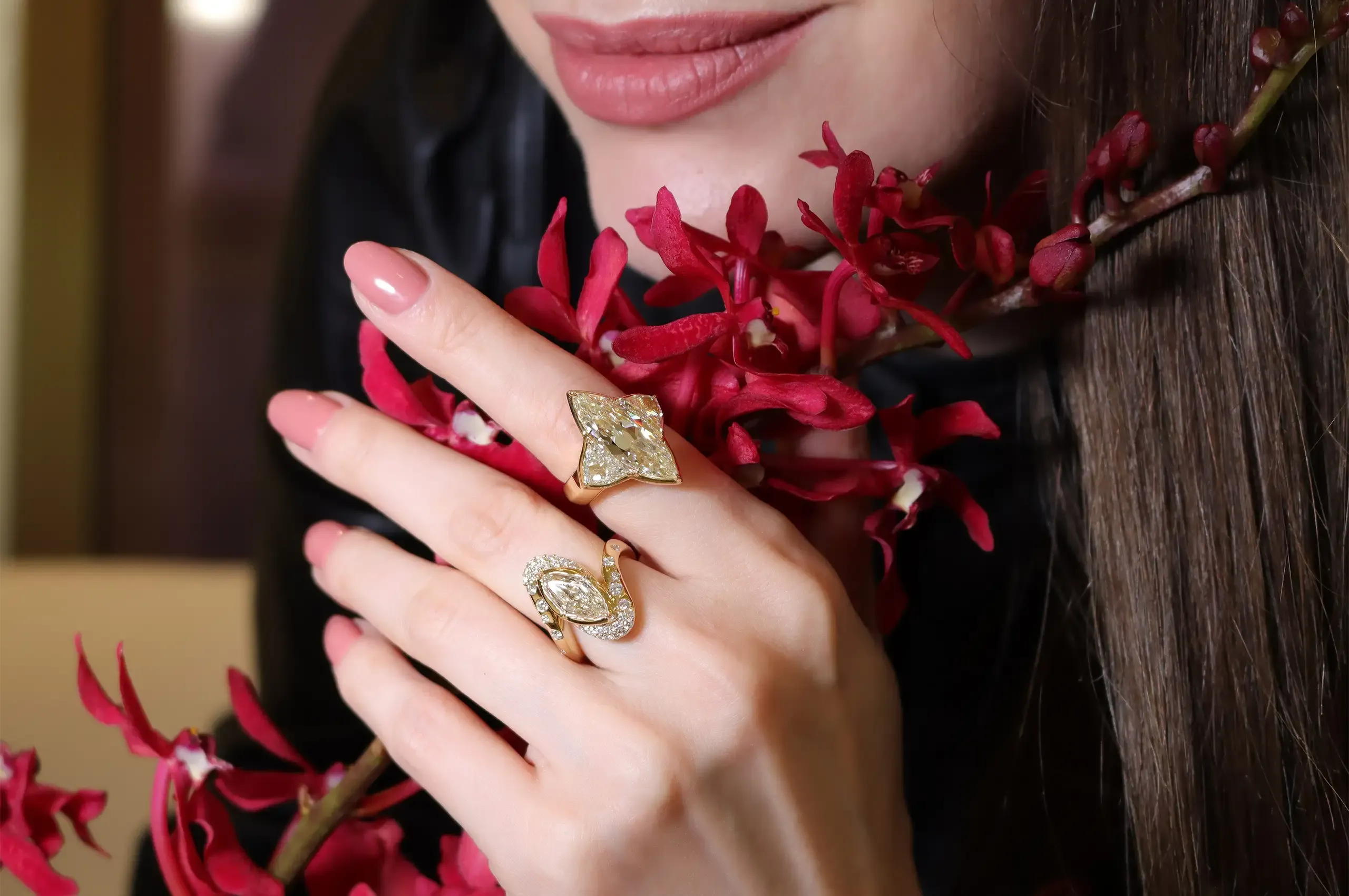 Two marquise-cut diamond designs from ANTON’s Luminous Collection, including a 3.03ct three-stone ring with Cadillac-cut side diamonds and a 2.15ct desert diamond pavé ring