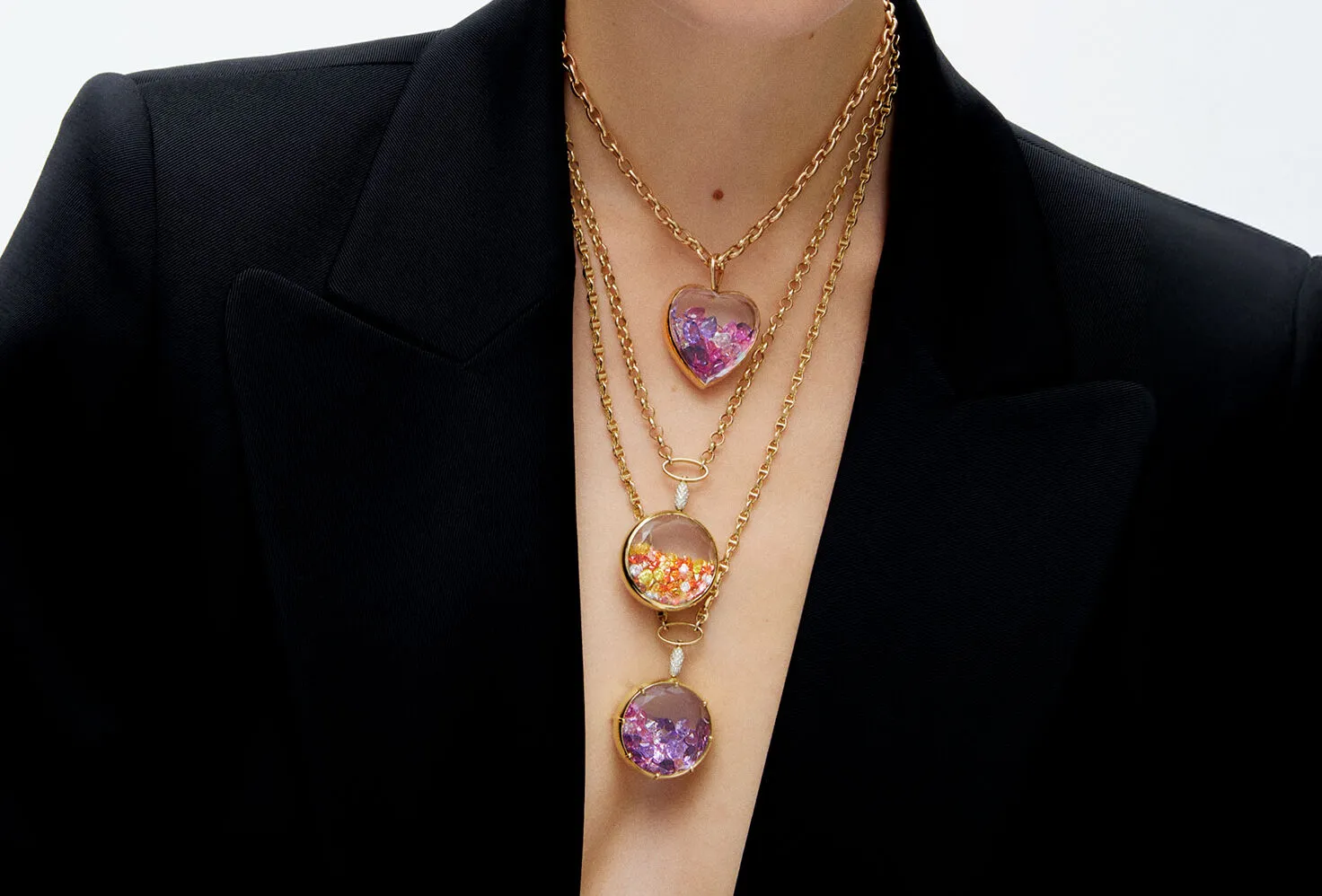 <p>Aponine white quartz medallions from the Sparks collection filled with multi-coloured crystals in 18k gold </p>
