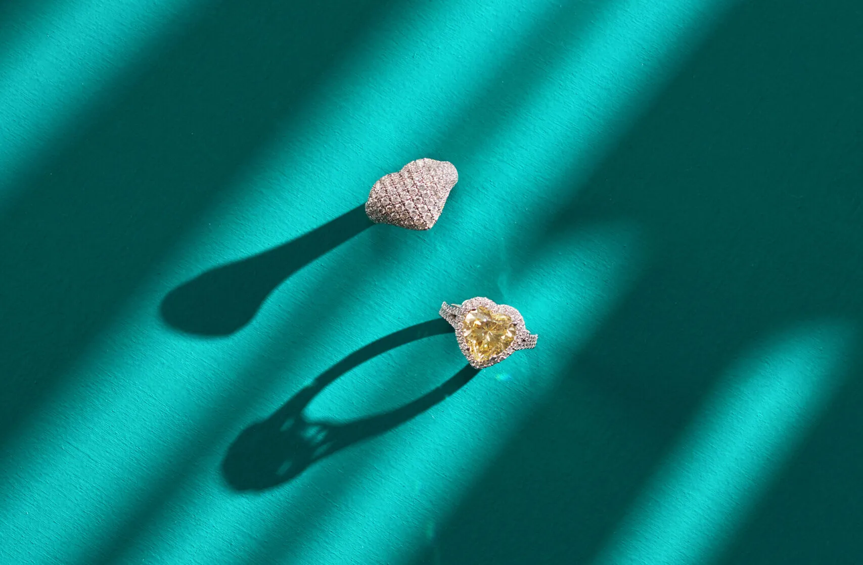 <p>Aponine Full Heart ring (top) with 2.36 carats of diamonds, part of the Mingle collection, and a Heart Drop ring with a 6.93 carat citrine and diamonds from the Sassy Classics collection</p>
