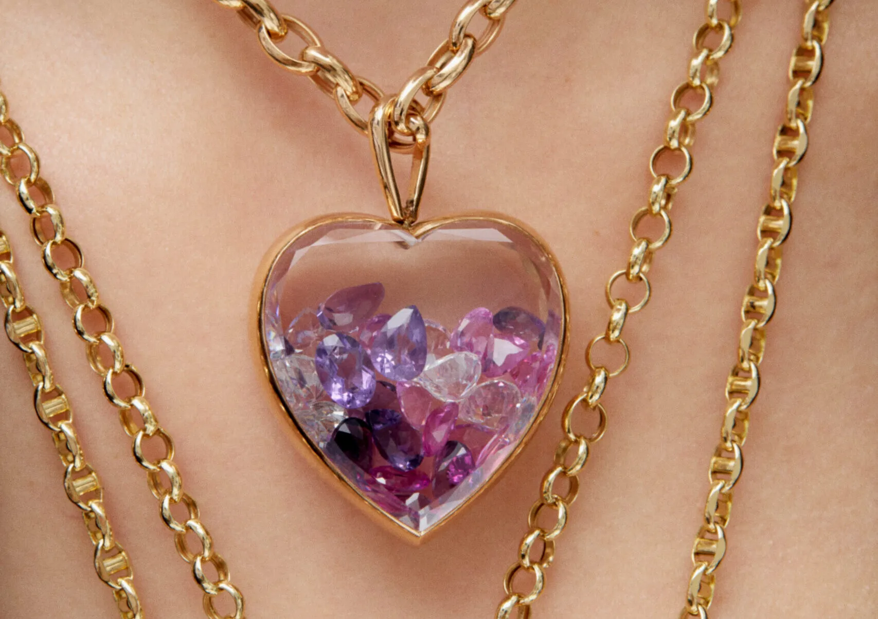 <p>Aponine Heart Medallion from the Sparks collection crafted in white quartz and 18k yellow gold, filled with diamonds and purple crystals totalling 24.21 carats</p>
