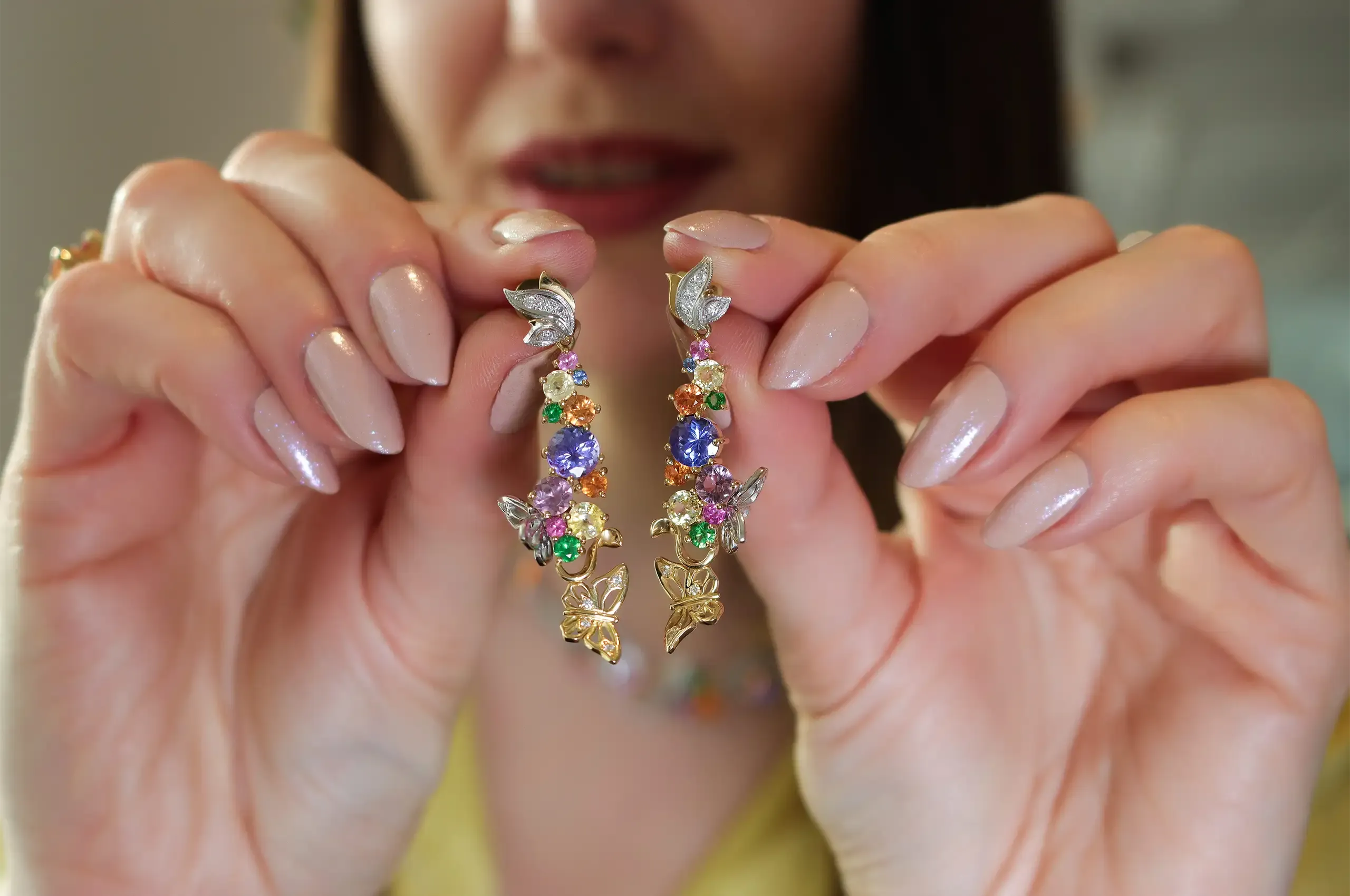 Artisans Bespoke Jewellers Borboleta earrings with tanzanite, spinel, tsavorite garnet, mandarin garnet, sapphires and diamonds set in 18k yellow and white gold 