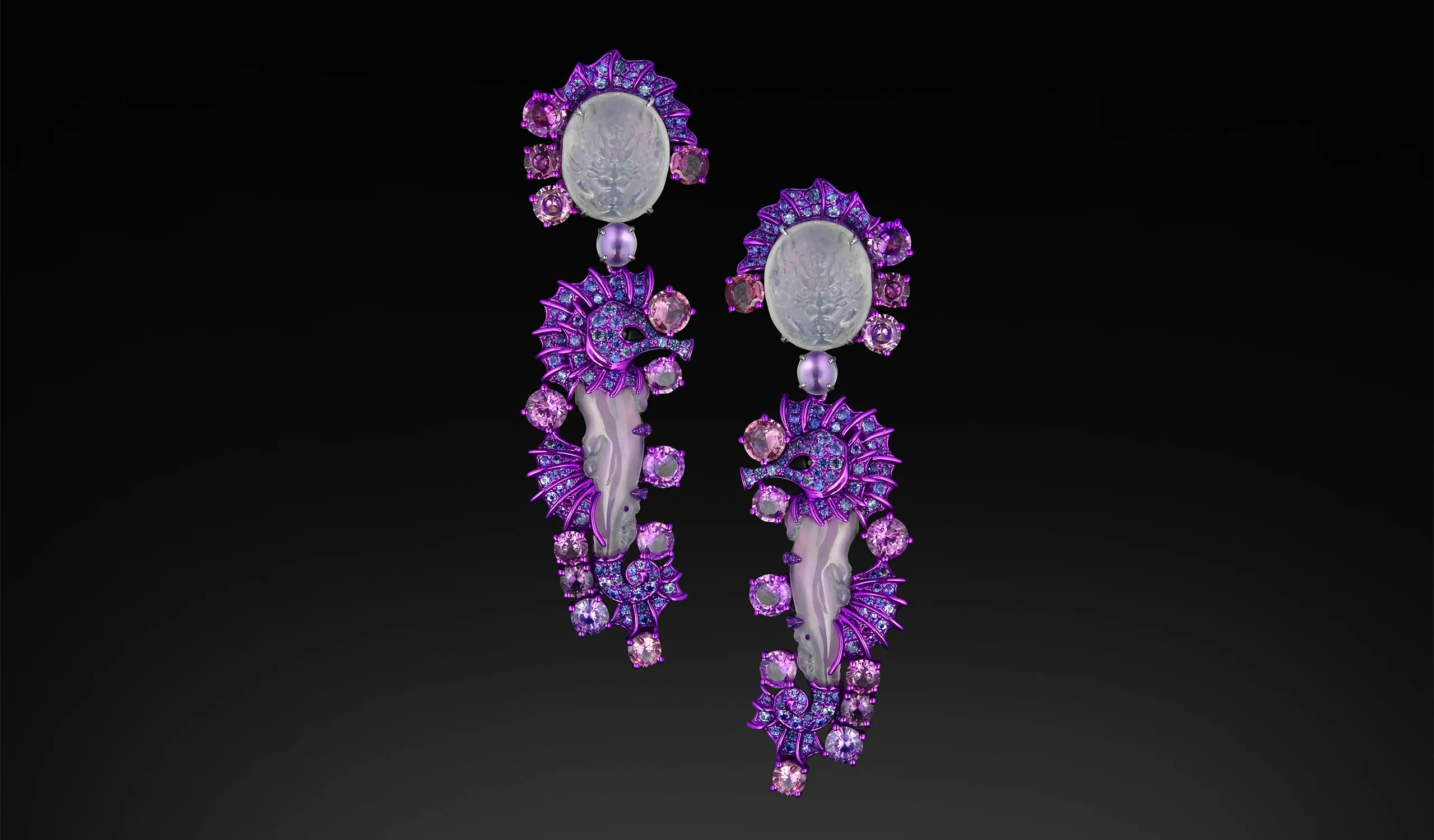 <p>Austy Lee The UltraViolet Hippocampus earrings from The Jade Dynasty collection with Burmese white jades, fancy purple, pink and blue sapphires and onyx set in 18k rose gold </p>