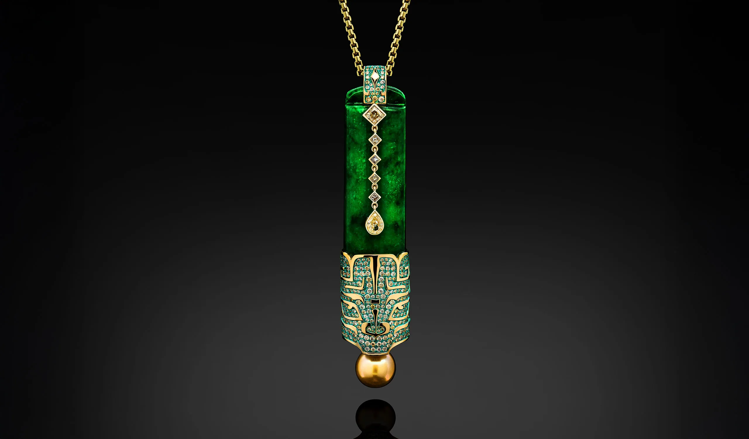 <p>Austy Lee The Taotie Column pendant from The Jade Dynasty collection with Burmese green jade, South Sea golden pearl, fancy yellow diamonds and fancy colour diamonds set in 18k yellow gold </p>