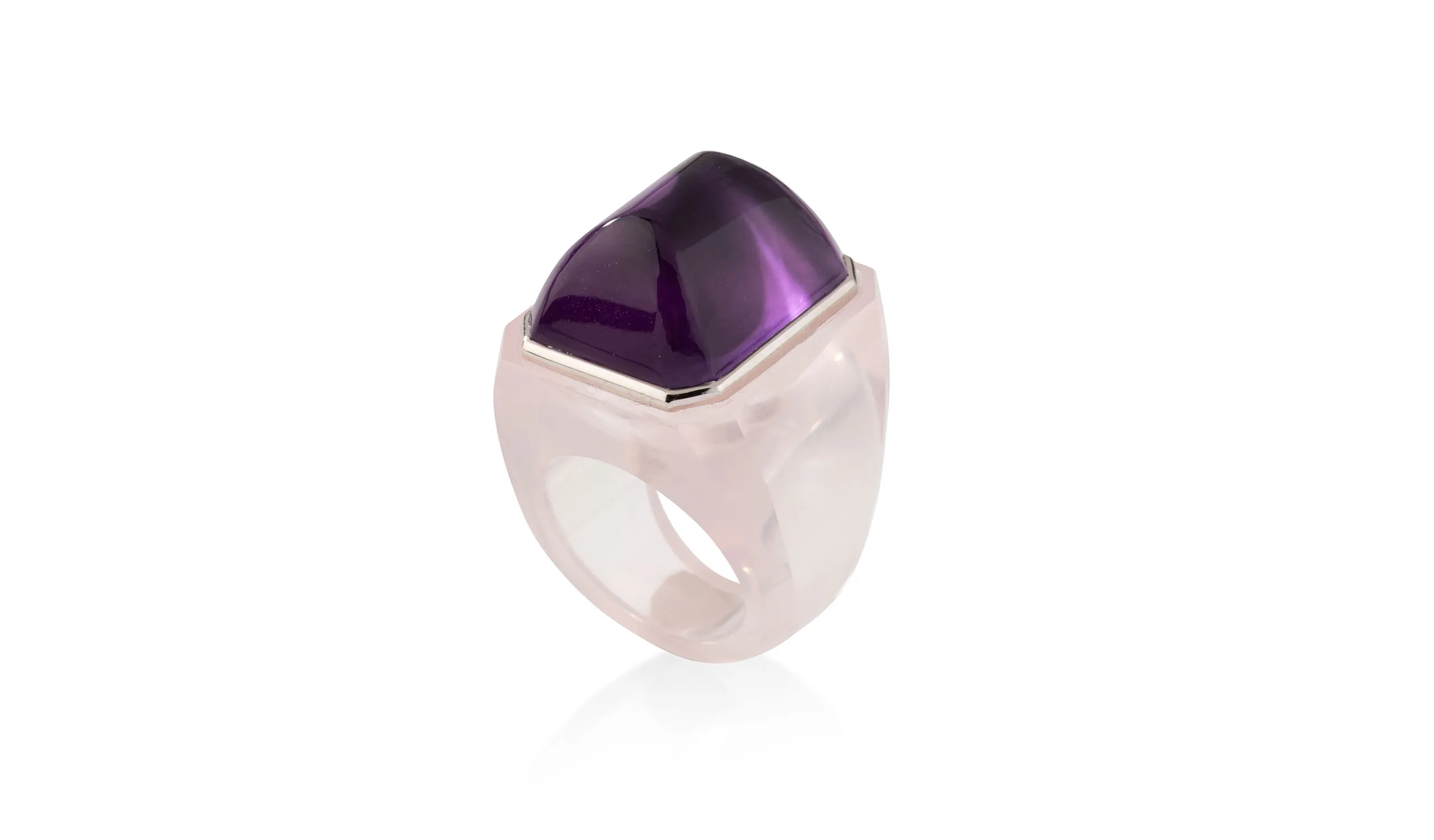 <p>A Réne Boivin ring circa 1935 in carved rose quartz, collet set with a sugarloaf amethyst in white gold, designed by Suzanne Belperron</p>
