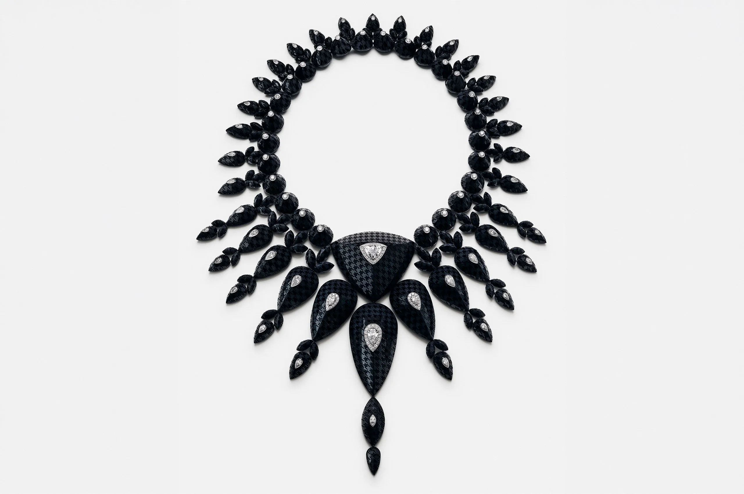 The Checkers necklace from Boucheron's Human Being Carte Blanche High Jewellery collection elevates the iconic checkerboard pattern into a sculptural work of high jewellery.