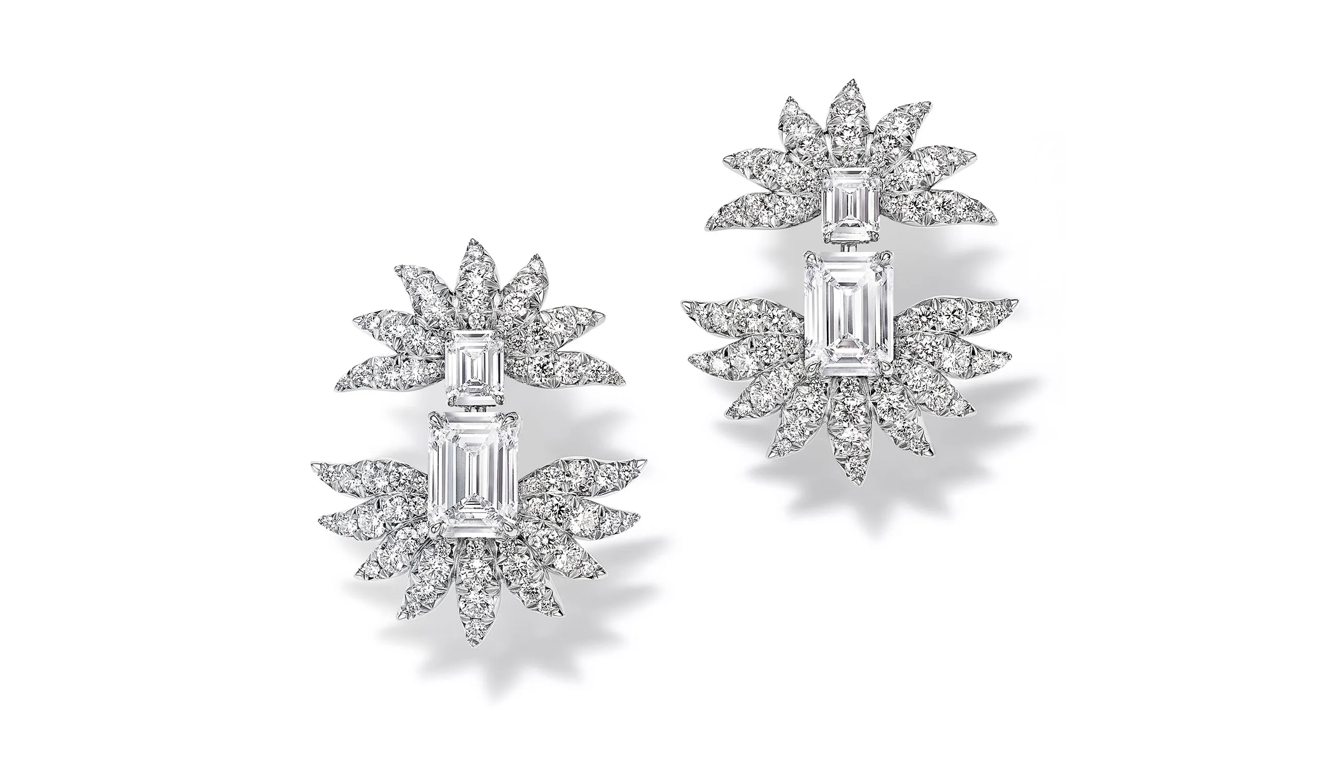 <p>Tiffany &amp; Co. Blue Book Hidden Garden Marguerite earrings in platinum with two emerald cut diamonds of 4.23ct and diamond accents</p>
