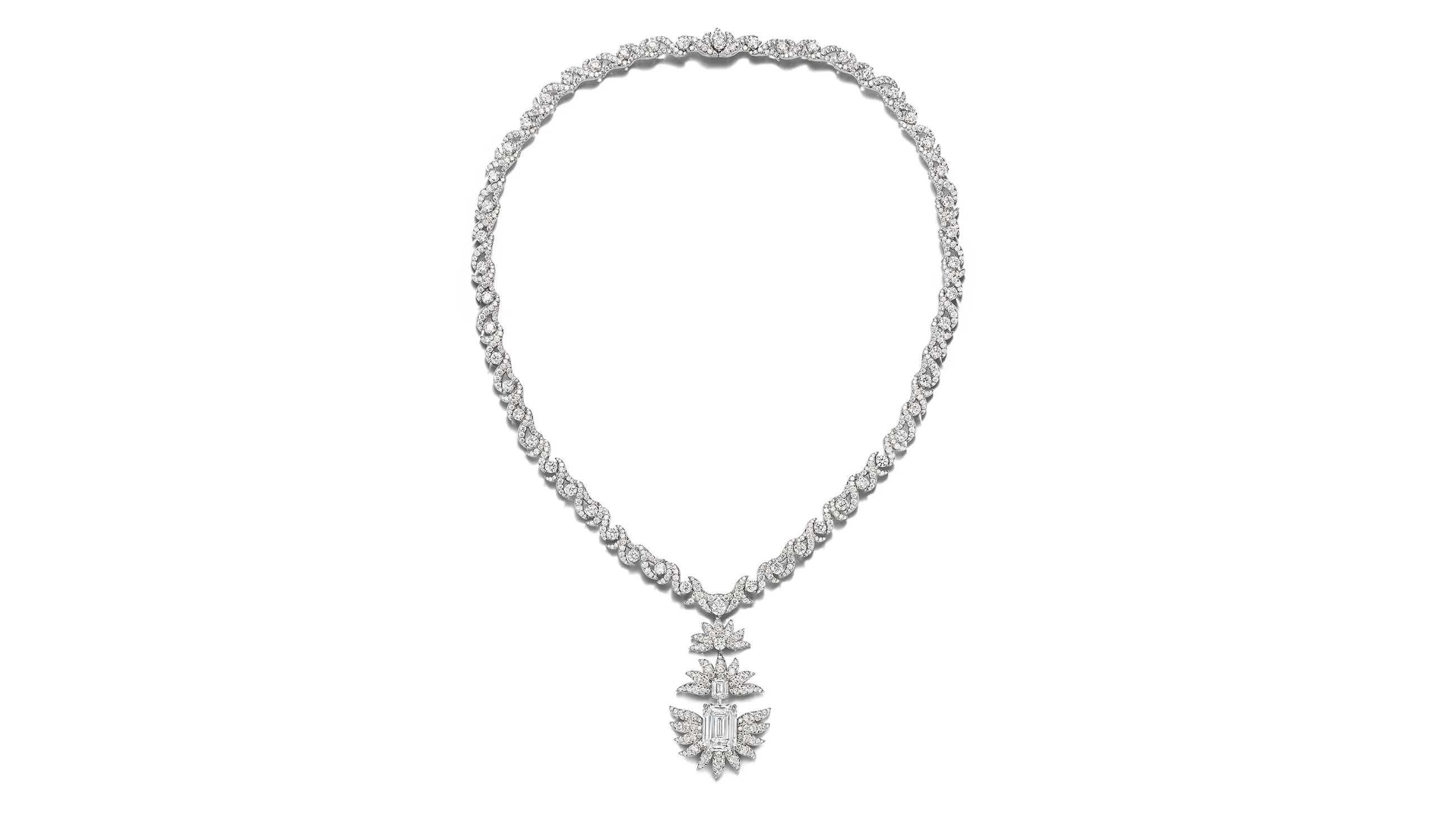 <p>Tiffany &amp; Co. Blue Book Hidden Garden transformable Marguerite necklace in platinum with a 6.06ct emerald cut diamond and diamond accents. The pendant can be worn as a brooch</p>
