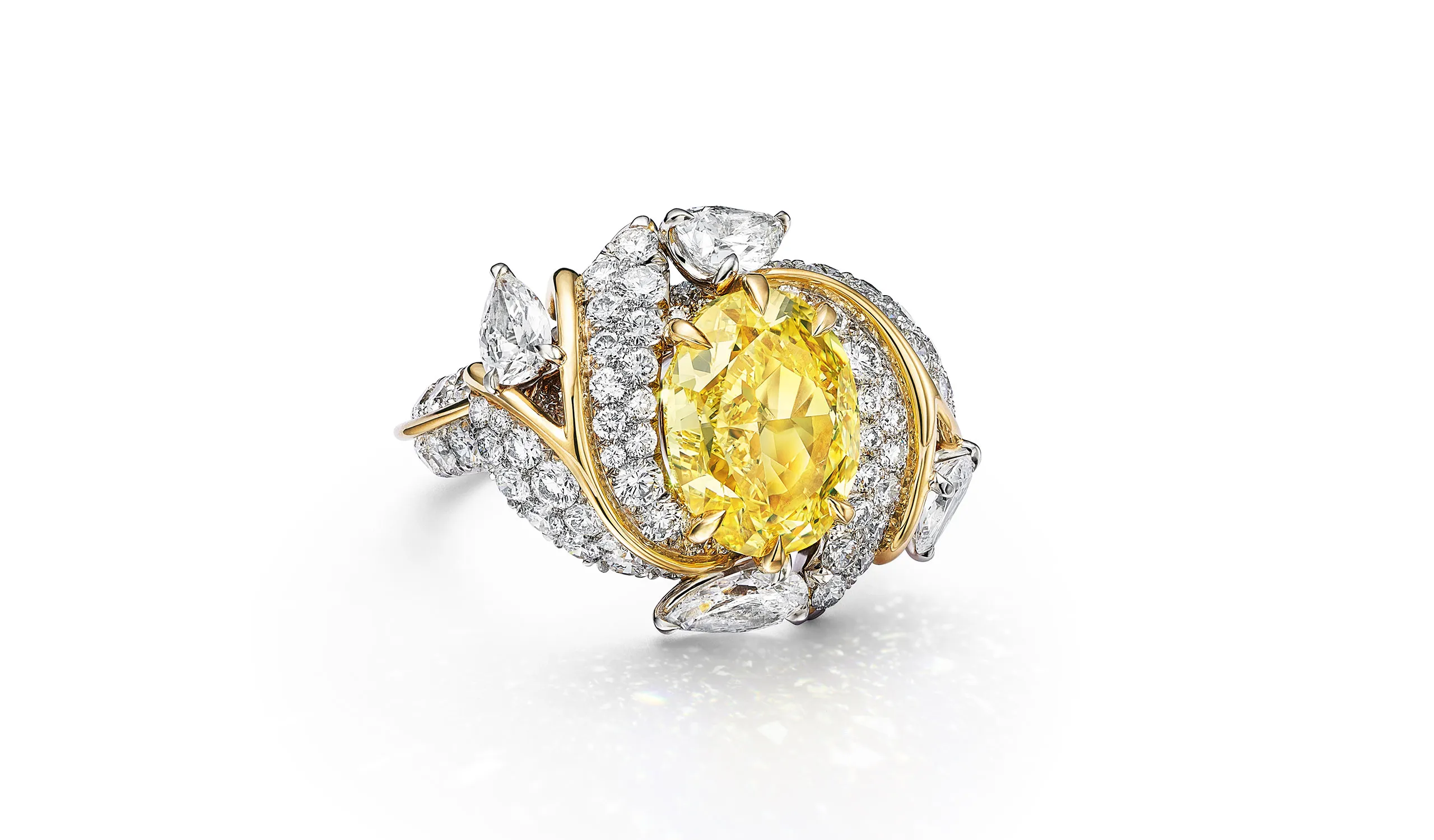 <p>Tiffany &amp; Co. Blue Book Hidden Garden Butterfly ring in platinum and 18k yellow gold with a 5.07ct oval Fancy Vivid Yellow diamond and white diamonds</p>
